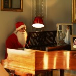 Santa plays the piano Santa plays the piano